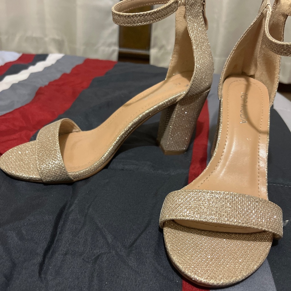 Gold high heels